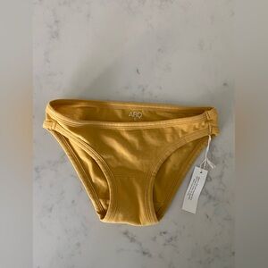 NWT ARQ Lou Undies. Buttercup, size small.